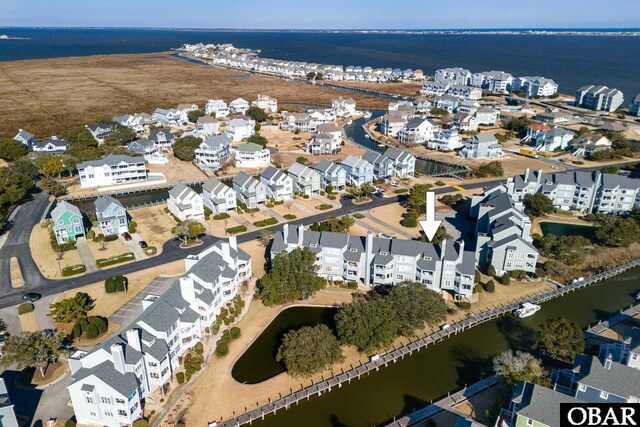 314 Pirates Way Unit 314B, Manteo, NC 27954 - aerial view of property's location featuring a large body of water and nearby suburban area