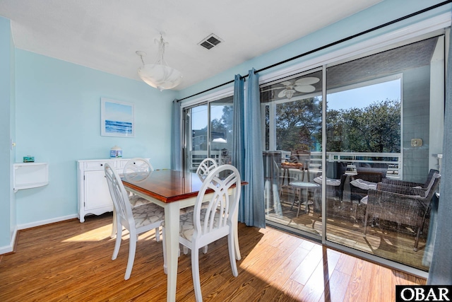 314 Pirates Way Unit 314B, Manteo, NC 27954 - dining area with plenty of natural light, wood finished floors, and baseboards
