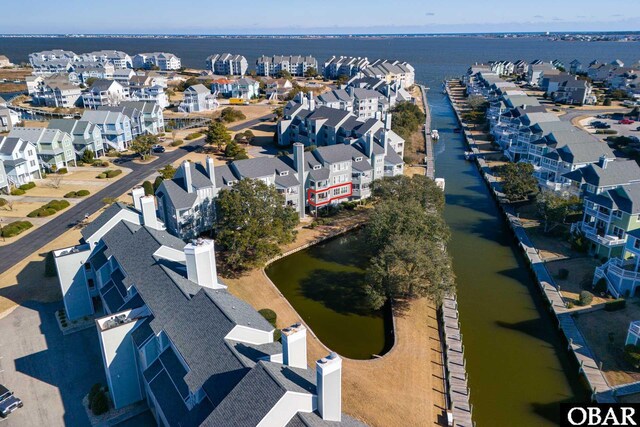 314 Pirates Way Unit 314B, Manteo, NC 27954 - aerial perspective of suburban area with a nearby body of water