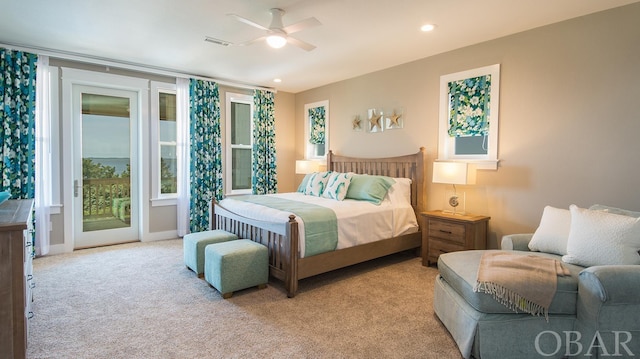 bedroom with ceiling fan, recessed lighting, light carpet, visible vents, and access to exterior