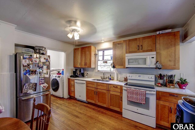 155 Loop Rd Lot 5, Ocracoke, NC 27960 - kitchen featuring white appliances, a sink, light countertops, a ceiling fan, and brown cabinets