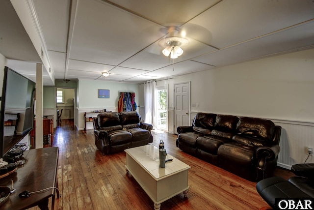 155 Loop Rd Lot 5, Ocracoke, NC 27960 - living room with dark wood finished floors, ceiling fan, and wainscoting