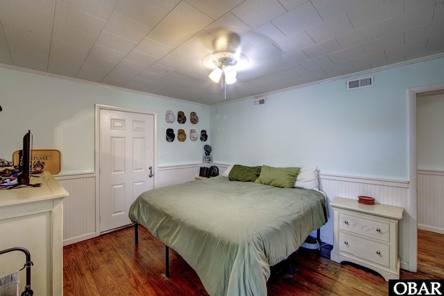 155 Loop Rd Lot 5, Ocracoke, NC 27960 - bedroom with wainscoting, wood finished floors, and ornamental molding