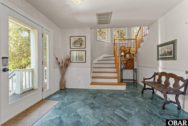 1148 Dunton Dr Lot 337, Corolla, NC 27927 - foyer entrance featuring wainscoting, stairs, and visible vents