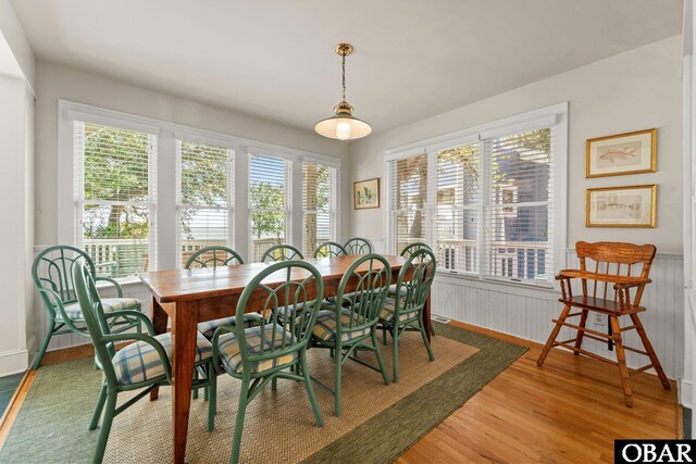 1148 Dunton Dr Lot 337, Corolla, NC 27927 - dining room with wainscoting and light wood-type flooring