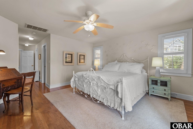 1148 Dunton Dr Lot 337, Corolla, NC 27927 - bedroom with baseboards, a ceiling fan, wood finished floors, and visible vents