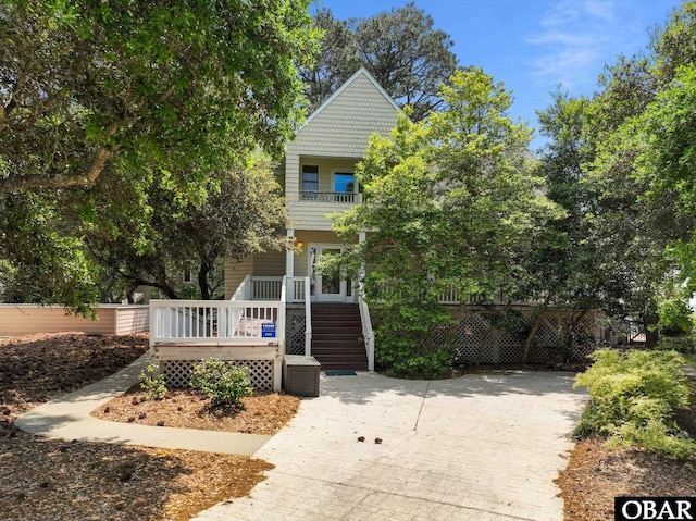 1148 Dunton Dr Lot 337, Corolla, NC 27927 - view of front of property with fence and a balcony