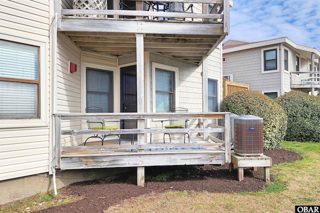 wooden deck with central AC unit