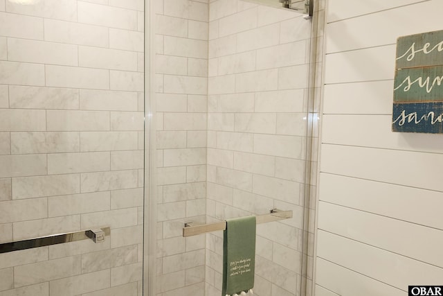 bathroom featuring a shower stall