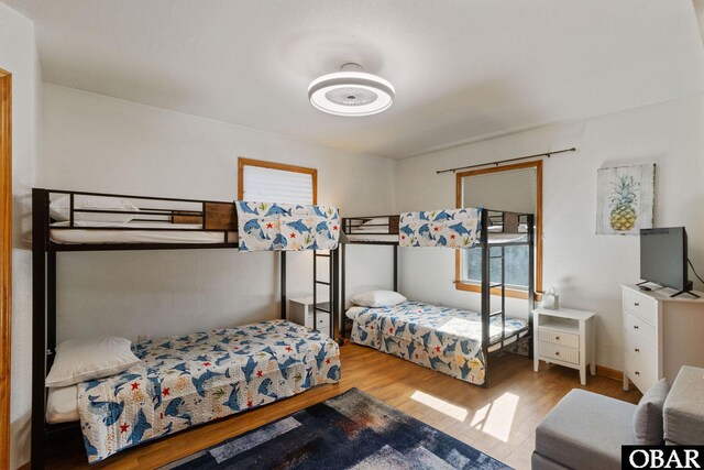 bedroom with wood finished floors