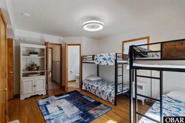 bedroom featuring wood finished floors