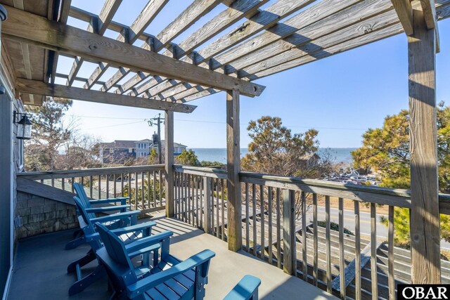 balcony featuring a pergola