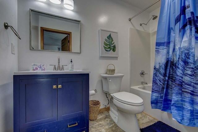 bathroom featuring toilet, shower / bath combination with curtain, vanity, and baseboards