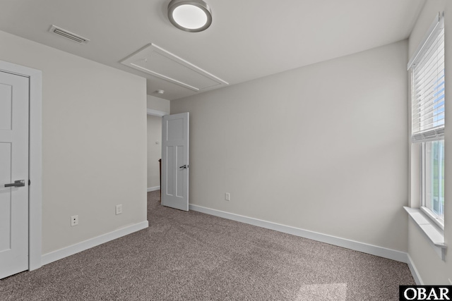 307 Sunny Lk Lot 106, Moyock, NC 27958 - unfurnished bedroom with attic access, carpet floors, and multiple windows