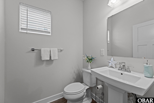 307 Sunny Lk Lot 106, Moyock, NC 27958 - half bath with toilet and wood finished floors