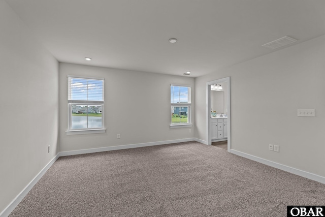 307 Sunny Lk Lot 106, Moyock, NC 27958 - carpeted spare room featuring plenty of natural light and recessed lighting