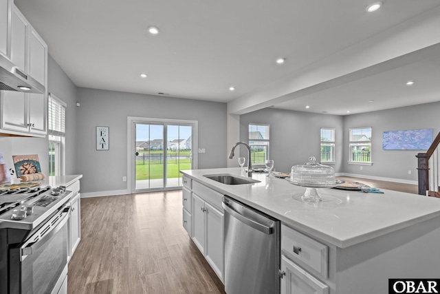 307 Sunny Lk Lot 106, Moyock, NC 27958 - kitchen with stainless steel appliances, light wood-style flooring, healthy amount of natural light, and recessed lighting