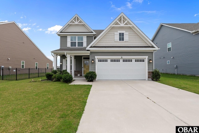 307 Sunny Lk Lot 106, Moyock, NC 27958 - craftsman-style house with concrete driveway, a garage, and covered porch