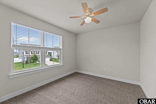 307 Sunny Lk Lot 106, Moyock, NC 27958 - carpeted spare room with baseboards and ceiling fan