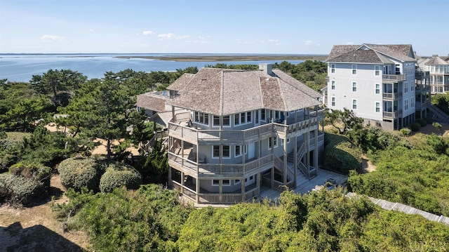 drone / aerial view featuring a water view