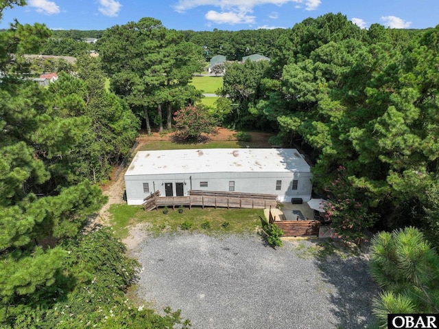 aerial view with a wooded view