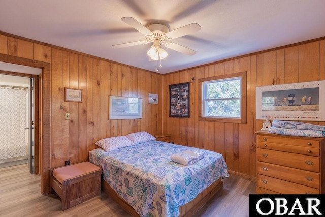 bedroom featuring ceiling fan and wood finished floors