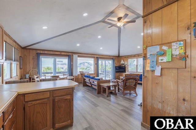 27250 Dory Rd Lot # 6, Salvo, NC 27972 - kitchen with wooden walls, lofted ceiling, open floor plan, a ceiling fan, and light countertops
