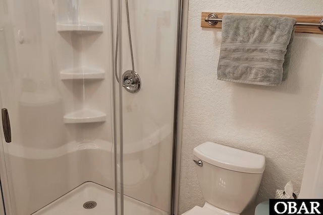 703 Suffolk St Lot 934, Kill Devil Hills, NC 27948 - full bath featuring a stall shower, toilet, and a textured wall