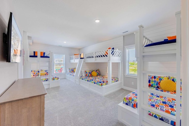 recreation room featuring recessed lighting, light colored carpet, visible vents, and baseboards