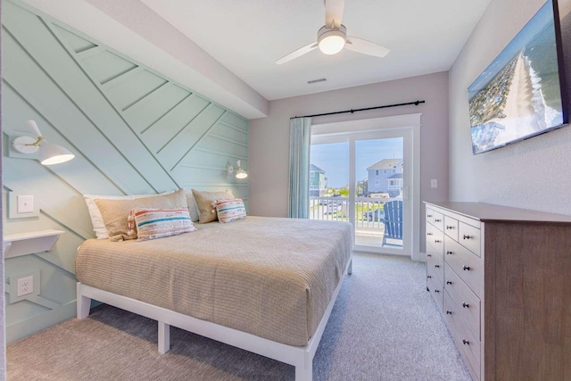 bedroom featuring access to outside, ceiling fan, and light colored carpet