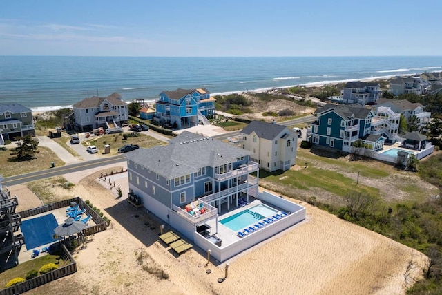 aerial view with a water view and a residential view