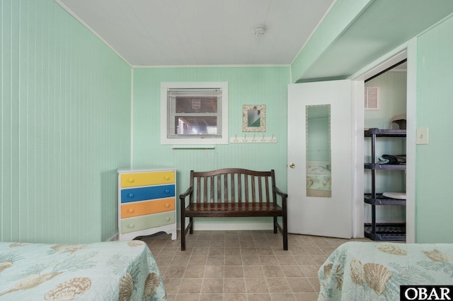 bedroom featuring crown molding