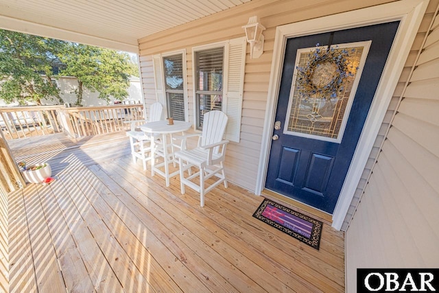 deck with covered porch