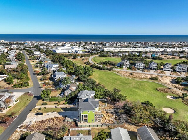 aerial view featuring a water view, a residential view, and golf course view