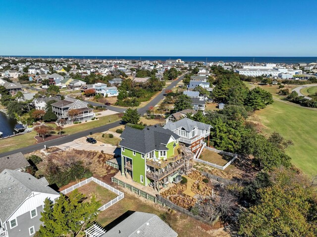 aerial view with a residential view and a water view