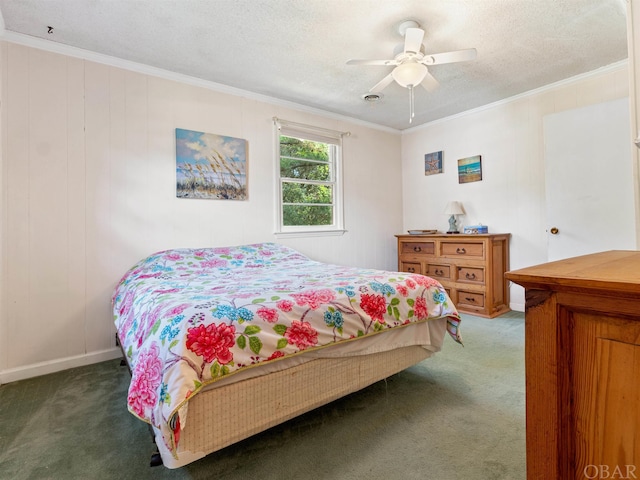 bedroom with crown molding, dark carpet, a textured ceiling, and a ceiling fan