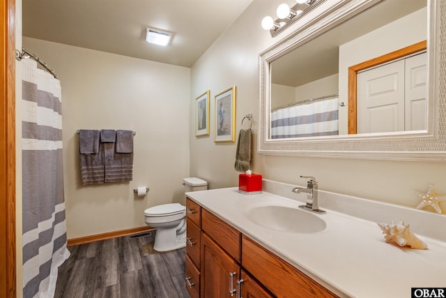 119 Baycliff Trl Lot 119, Kill Devil Hills, NC 27948 - bathroom featuring vanity, wood finished floors, toilet, and baseboards