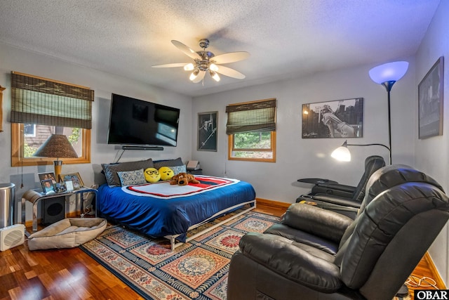 119 Baycliff Trl Lot 119, Kill Devil Hills, NC 27948 - bedroom featuring wood finished floors, a textured ceiling, and ceiling fan