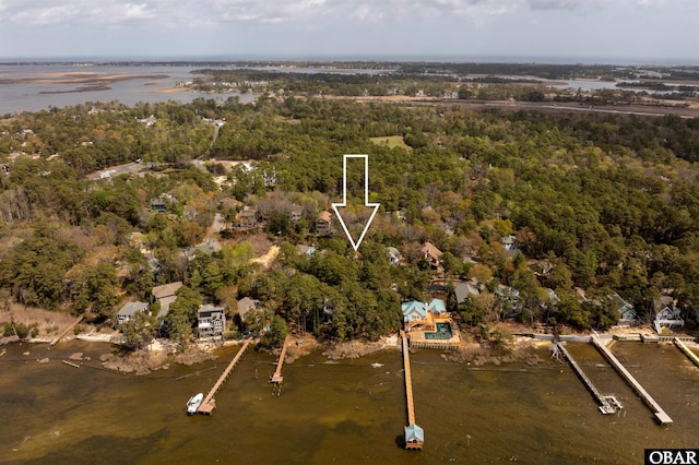119 Baycliff Trl Lot 119, Kill Devil Hills, NC 27948 - aerial overview of property's location featuring a forest and a large body of water