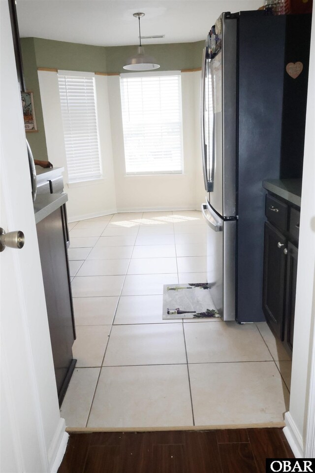 169 Green View Rd Lot # 273, Moyock, NC 27958 - kitchen featuring freestanding refrigerator, light tile patterned floors, and pendant lighting