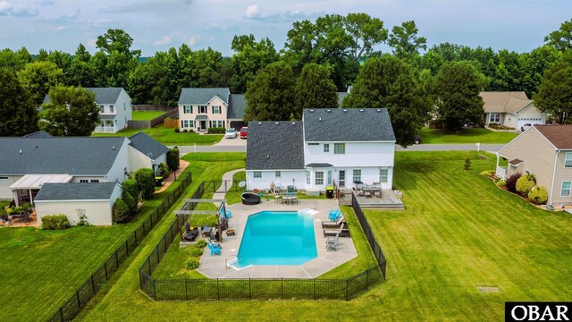 169 Green View Rd Lot # 273, Moyock, NC 27958 - rear view of property featuring a fenced backyard, a residential view, and roof with shingles