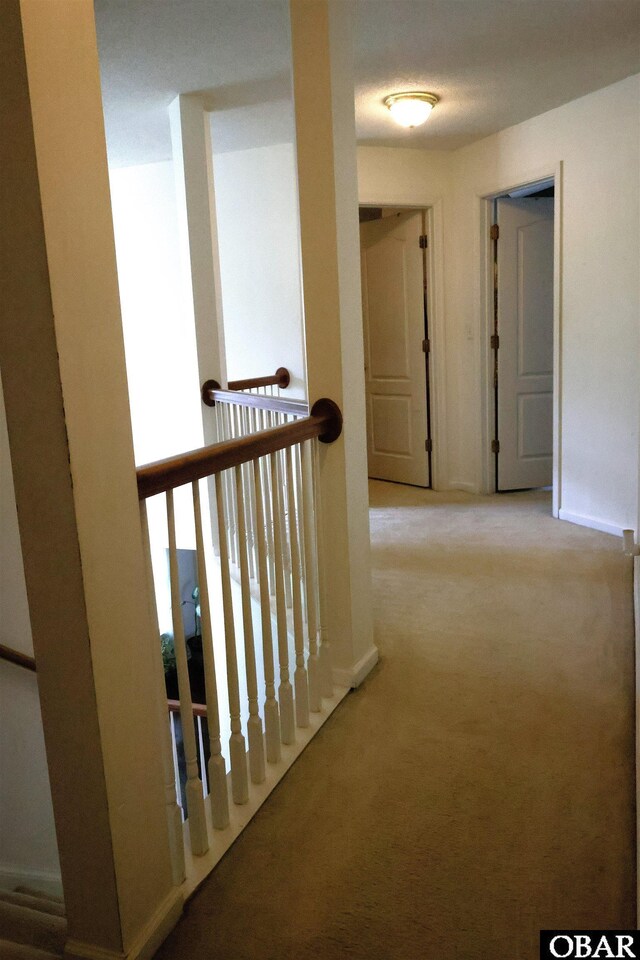 169 Green View Rd Lot # 273, Moyock, NC 27958 - hall with carpet floors and an upstairs landing