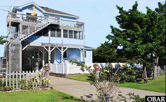 27211 Dory Rd Lot 22, Salvo, NC 27972 - view of front of home with covered porch, driveway, and stairway