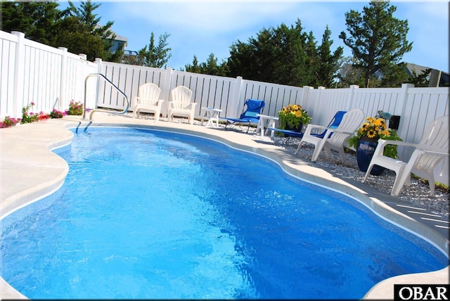 27211 Dory Rd Lot 22, Salvo, NC 27972 - view of swimming pool featuring a fenced backyard and a patio