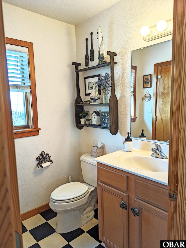 27211 Dory Rd Lot 22, Salvo, NC 27972 - half bath with tile patterned floors, toilet, vanity, and baseboards