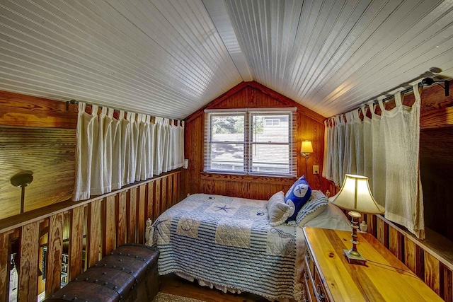 bedroom featuring wood ceiling, lofted ceiling, and wooden walls