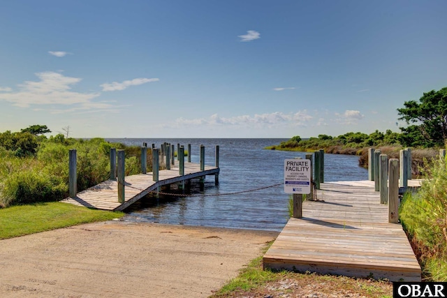 view of dock with a water view