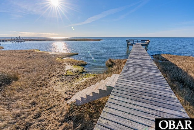 dock area featuring a water view
