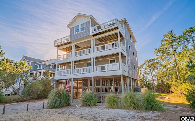 view of front of property with a balcony