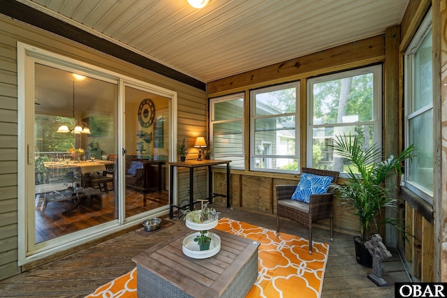 116 First Colony Ct Lot 4, Manteo, NC 27954 - sunroom featuring plenty of natural light and a chandelier